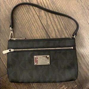 Wristlet-style Michael Kors purse